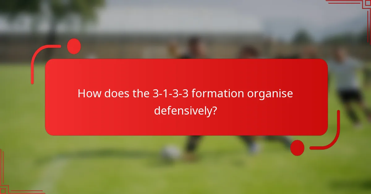 How does the 3-1-3-3 formation organise defensively?