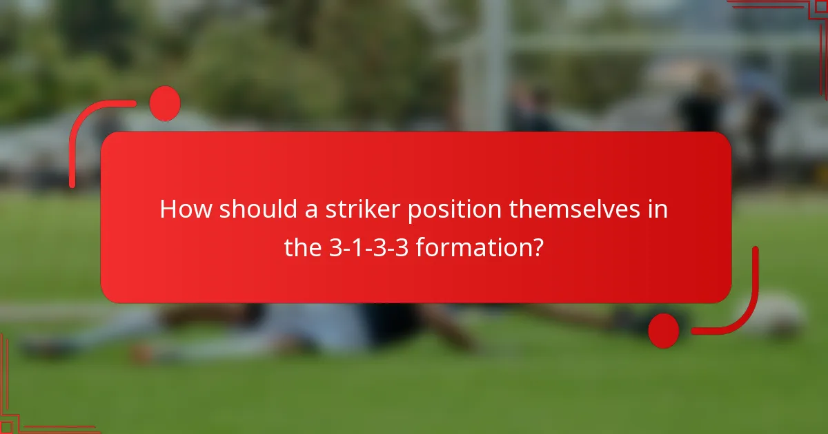 How should a striker position themselves in the 3-1-3-3 formation?