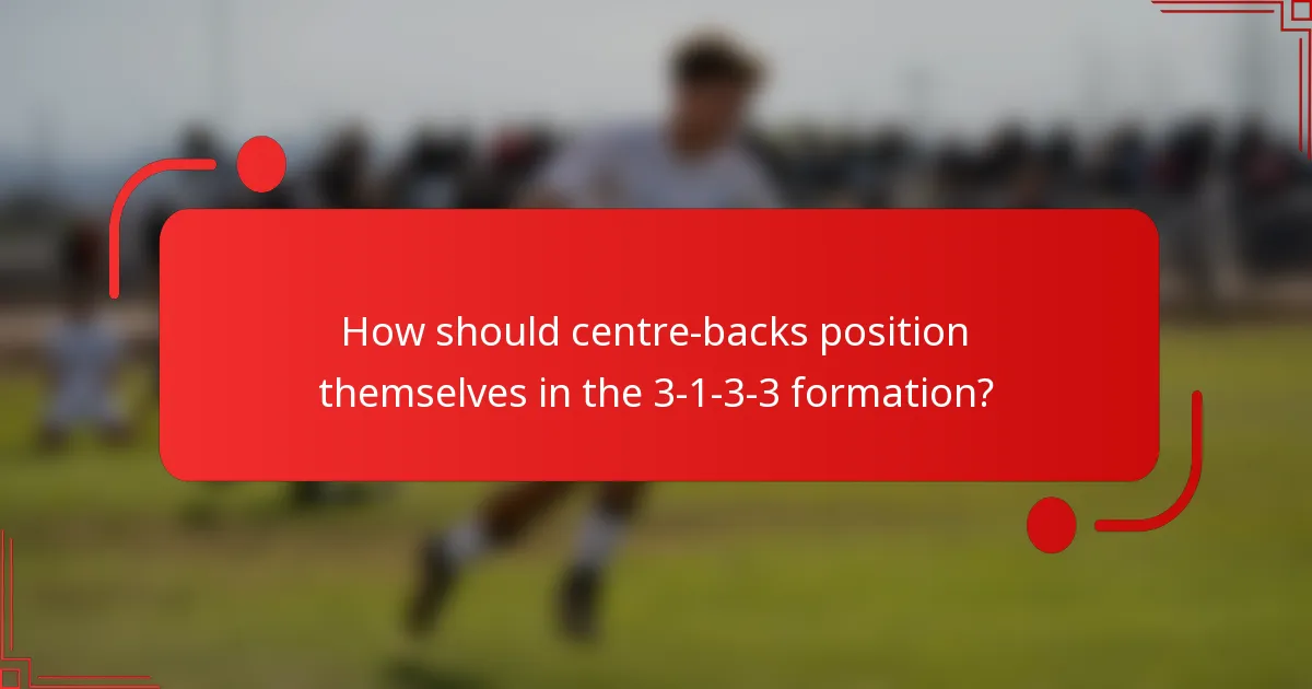 How should centre-backs position themselves in the 3-1-3-3 formation?